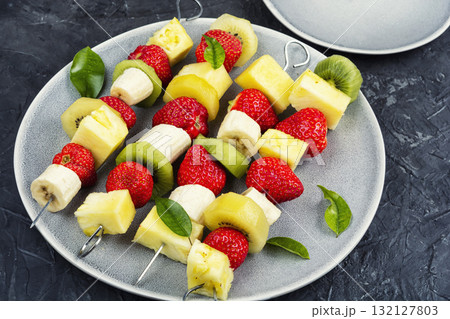 Fruit on skewer, mini snacks. Fruit on skewer, mini snacks. 132127803