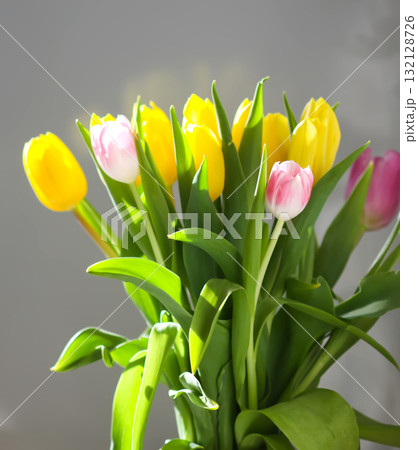 Cheerful bouquet of yellow tulips for spring season. 132128726