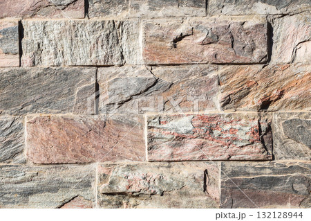 Stone background texture, masonry wall made of rock massif Stone background texture, masonry wall made of rock massif 132128944