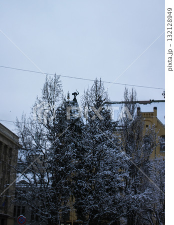 Latvian capital Riga in winter with snow-covered rooftops. 132128949