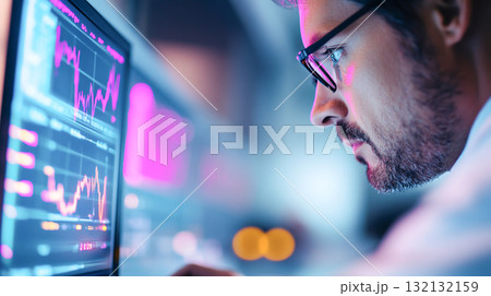 Engineer analyzing data on computer screen with graphs and charts 132132159