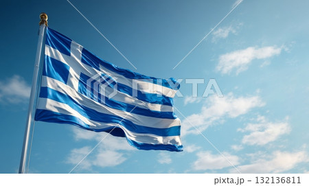 Celebrating Lithuanias independence day with the national flag waving proudly against a clear blue sky 132136811