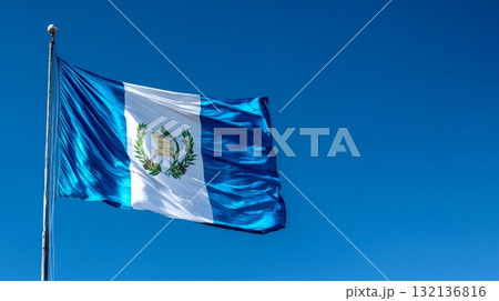 Celebrating Lithuanias independence day with the national flag waving proudly against a clear blue sky Celebrating Lithuanias independence day with the national flag waving proudly against a clear blue sky 132136816