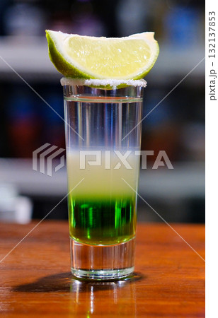 Set of sliced shot cocktails isolated on dark background 132137853