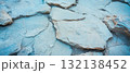 Light stone wall features textured surface and rough appearance ideal for backgrounds. 132138452