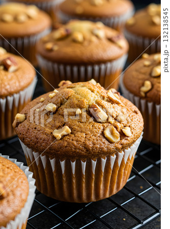 Freshly Baked Nut Muffins on Cooling Rack (Close-Up) 132138545