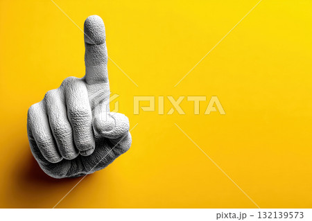A male hand with the index finger pointing up 132139573