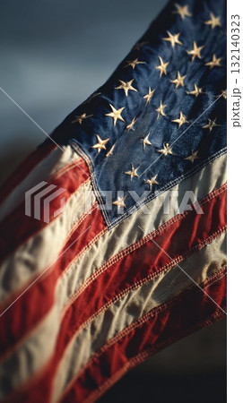 Waving American Flag Against a Clear Blue Sky Captures Patriotism and National Pride 132140323