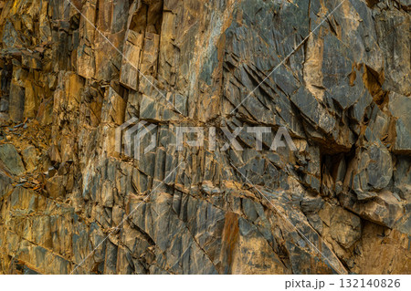 Rugged rock formation in mountainous outdoor setting 132140826