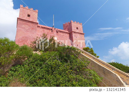 Summer Maltese landscape with the St. Agathas Tower. It is a large watchtower Summer Maltese landscape with the St. Agathas Tower. It is a large watchtower 132141345
