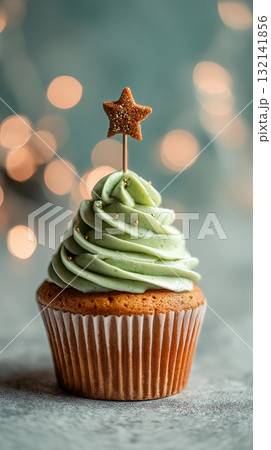 Festive Cupcake With Green Frosting and Star Decoration in a Cozy Holiday Setting Festive Cupcake With Green Frosting and Star Decoration in a Cozy Holiday Setting 132141856