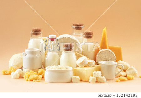 Colorful mix of dairy products varieties: milk and cheese, butter and mozzarella, yogurt and camembert. Food ingredients background 132142195