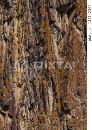 Rugged rock formation in mountainous outdoor setting 132142566