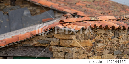 Rustic Stone House Roof with Terra Cotta Tiles Rustic Stone House Roof with Terra Cotta Tiles 132144555