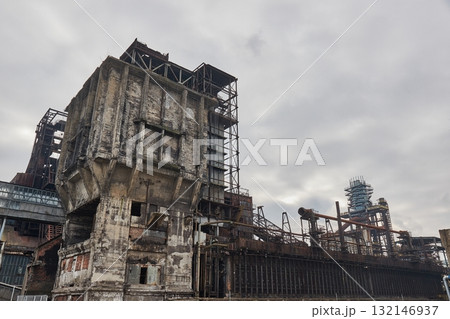 Decaying remains of an industrial facility 132146937