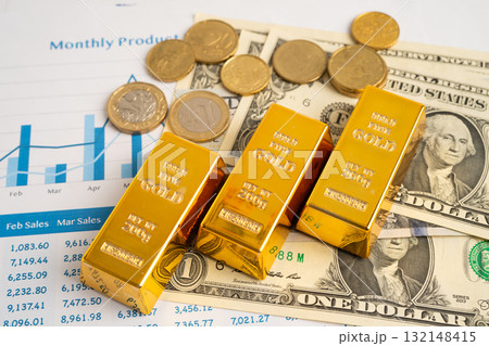 Gold bars with US dollar banknote money, finance trading investment business currency. Gold bars with US dollar banknote money, finance trading investment business currency. 132148415