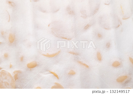 Tempeh texture background, Traditional Indonesian food, Healthy vegan and plant based ingredients Tempeh texture background, Traditional Indonesian food, Healthy vegan and plant based ingredients 132149517