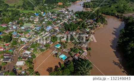 Aerial view of Karen Ruammit Elephant Camp village in Chiang Rai province of Thailand flooded after Kok river rising. 132149843