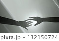 Shadow of Two Hands trying to Reaching each others. Helping Hand. Support, Partnership 132150724