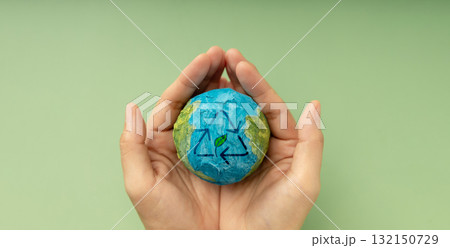 Earth in hands symbolizing sustainability, Recyling and Renewable Earth in hands symbolizing sustainability, Recyling and Renewable 132150729