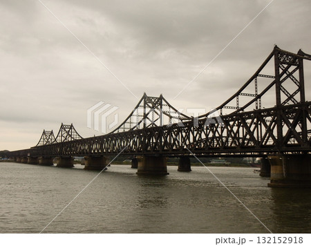 Sino-Korean Friendship Bridge across the Yalu River. It crosses from Dandong in China to Sinuiju in North Korea. 132152918
