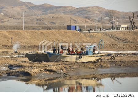 An old barge on a river in rural North Korea An old barge on a river in rural North Korea 132152965