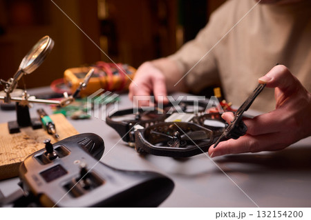 Conducting Detailed and Precise Repair Work Using Various Tools and Electronic Components 132154200