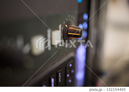 A Detailed Close-up Showing Controls and Displays of Professional Audio Equipment Systems A Detailed Close-up Showing Controls and Displays of Professional Audio Equipment Systems 132154405