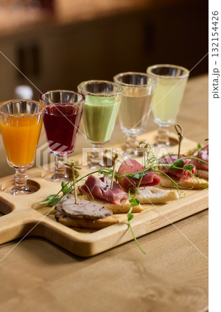 Enjoy artisan crafted cocktails paired with a delightful charcuterie board experience Enjoy artisan crafted cocktails paired with a delightful charcuterie board experience 132154426