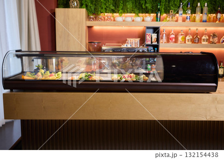 A Variety of Delicious Dishes Are Beautifully Displayed in the Restaurants Bar Area A Variety of Delicious Dishes Are Beautifully Displayed in the Restaurants Bar Area 132154438