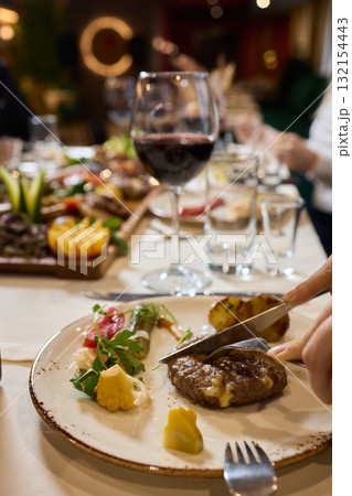 Cheers to a Fantastic Celebration Friends Joyfully Toasting with Wine Glasses in Hand Cheers to a Fantastic Celebration Friends Joyfully Toasting with Wine Glasses in Hand 132154443