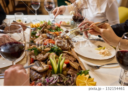 An Elegant Dining Experience Featuring a Lavish Feast of a Wide Variety of Dishes 132154461