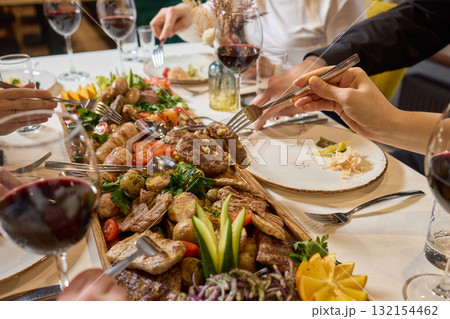 An Elegant Dining Experience Featuring a Lavish Feast of a Wide Variety of Dishes An Elegant Dining Experience Featuring a Lavish Feast of a Wide Variety of Dishes 132154462