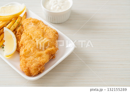 fish and chips - fried fish fillet with potatoes chips 132155289