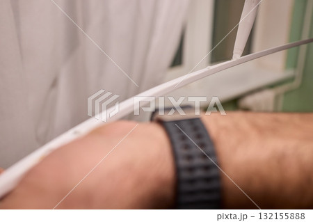 Hand Applying Adhesive with a Caulking Gun for Various Home Interior and Exterior Projects 132155888