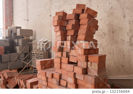 A closeup image of Stacked Bricks showcased in a dynamic Construction Environment A closeup image of Stacked Bricks showcased in a dynamic Construction Environment 132156084