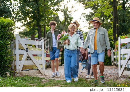 Farmer family portrait. Parents, grandparents and kids. Farmer family portrait. Parents, grandparents and kids. 132156234