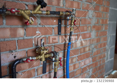 The process of Industrial Plumbing Installation involving the use of Brass Valves and Pipes The process of Industrial Plumbing Installation involving the use of Brass Valves and Pipes 132156988