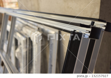 Stacked window frames are now fully prepared and ready for the upcoming installation process 132157027