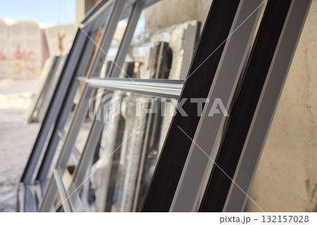 Stacked window frames are now fully prepared and ready for the upcoming installation process 132157028