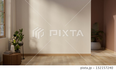 Empty white wall along the wooden floor corridor or hallway with potted plant and wooden stool table 132157240