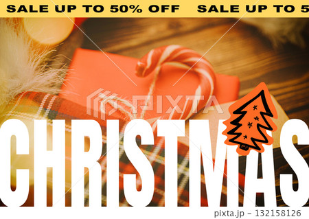Christmas sale with gifts and decorations on a wooden table 132158126