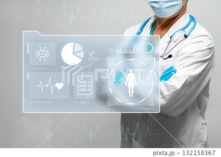 Healthcare professional interacting with digital health data in a modern clinic setting Healthcare professional interacting with digital health data in a modern clinic setting 132158367