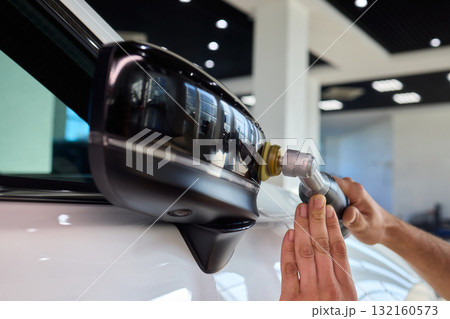 Experience the Art of Professional Car Detailing with a Polishing Tool in Action Today Experience the Art of Professional Car Detailing with a Polishing Tool in Action Today 132160573