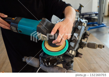 Experience the Art of Professional Car Detailing with a Polishing Tool in Action Today Experience the Art of Professional Car Detailing with a Polishing Tool in Action Today 132160703