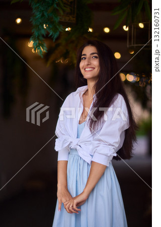 Elegant Outdoor Fashion A Stylish Woman Looking Fabulous in a Casual Yet Chic Look Elegant Outdoor Fashion A Stylish Woman Looking Fabulous in a Casual Yet Chic Look 132160731