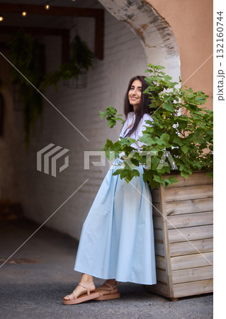 Elegant Outdoor Fashion A Stylish Woman Looking Fabulous in a Casual Yet Chic Look Elegant Outdoor Fashion A Stylish Woman Looking Fabulous in a Casual Yet Chic Look 132160744