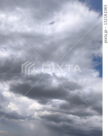 Ominous Sky A Dramatic Display of Dark Clouds Before the Storm, Weather Majesty Above Ominous Sky A Dramatic Display of Dark Clouds Before the Storm, Weather Majesty Above 132161065