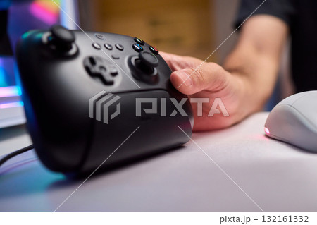 Gaming Controller in Action Dive into an Engaging and Thrilling Gameplay Experience Gaming Controller in Action Dive into an Engaging and Thrilling Gameplay Experience 132161332