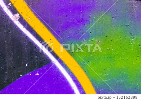 Vibrant Graffiti Art with Bold Purple and Green Streaks in Urban 90s Style 132162899